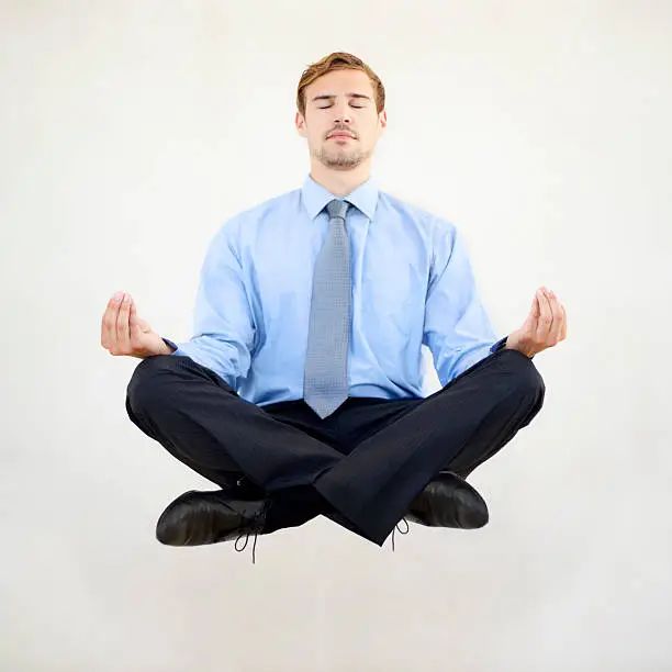 Meditating makes a businessman float