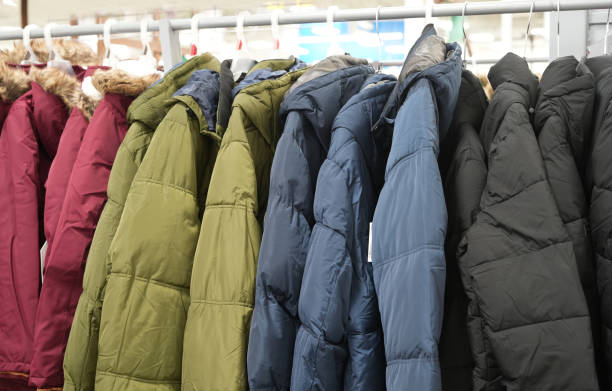 istock various collection winter coats hanging on a clothes rack 1853004301