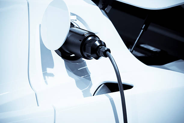 istock Electric vehicle charging at pump 185300987