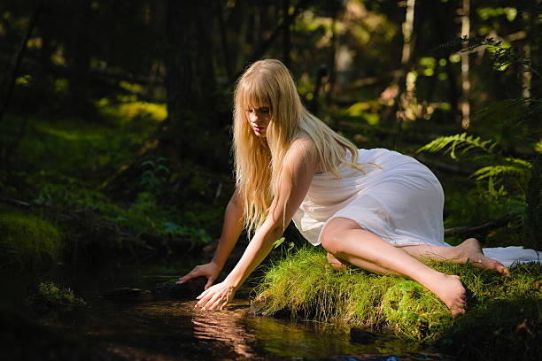 istock Woman on creek 185301407