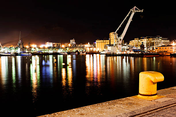 istock Lights reflected in the sea at Cape Town's trendy Waterfront 185301559