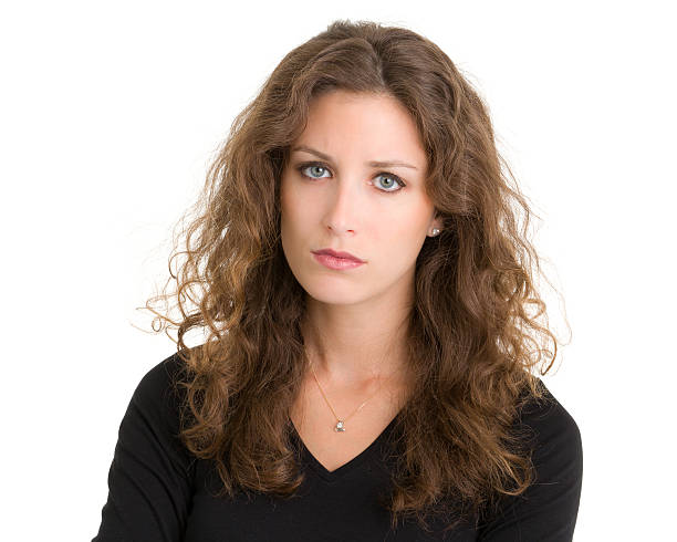 istock Serious Young Woman Close Up Portrait 185301916