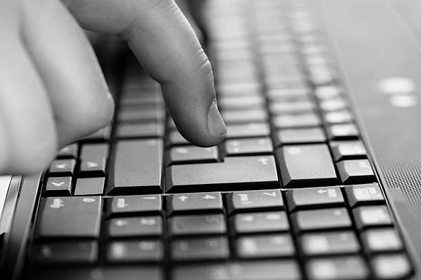 istock Young Male Office Worker on Laptop 185301970