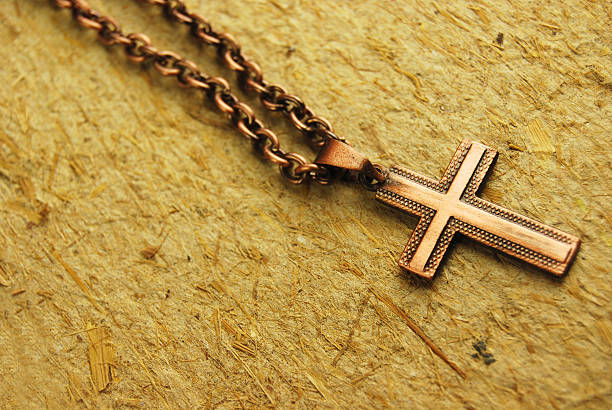 istock Metalic rosary over a cardboard rough surface 185302278