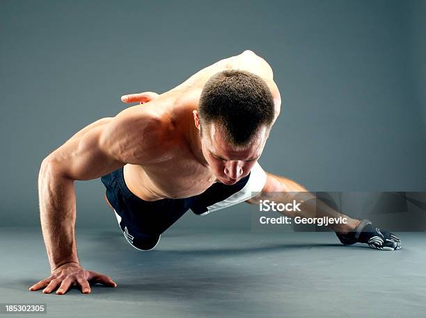 Fitness Guy One Hand Pushup Stock Photo - Download Image Now - One Person, Push-ups, Men