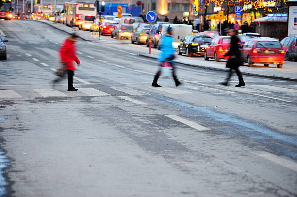 istock Pedestrians, cars in traffic 185303250