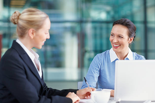 istock Business women in discussion 185303335