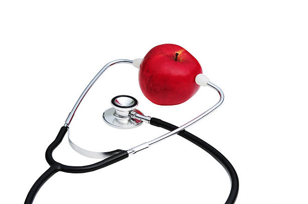 stethoscope and apple stock photo