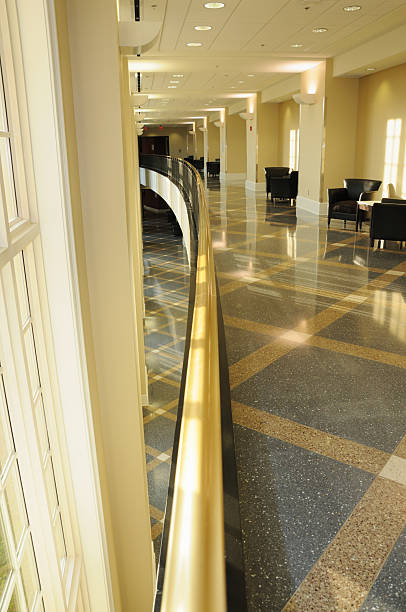 istock Two story curved hallway in modern building 185303961