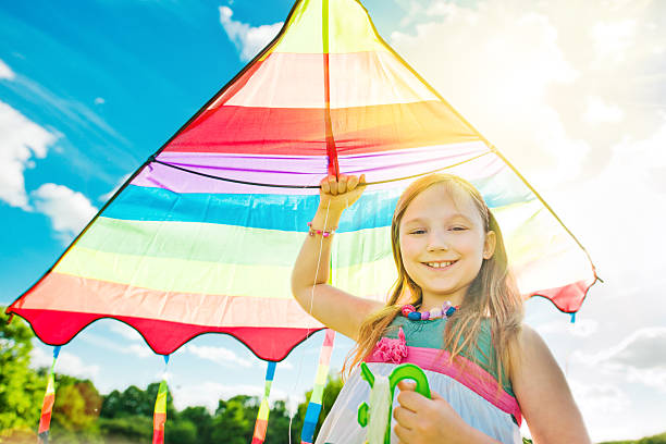 istock Little girl flying a kite 185305063