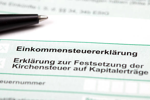 istock German tax form and pen - close up 185305358