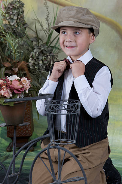 istock Old Fashioned News boy fixing his bowtie 185306071