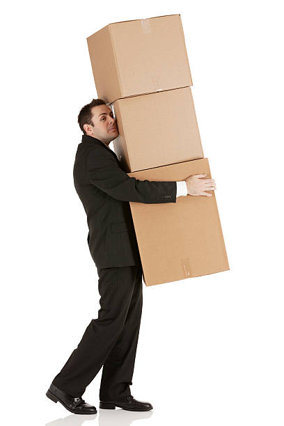 istock Businessman carrying cardboard boxes 185306169