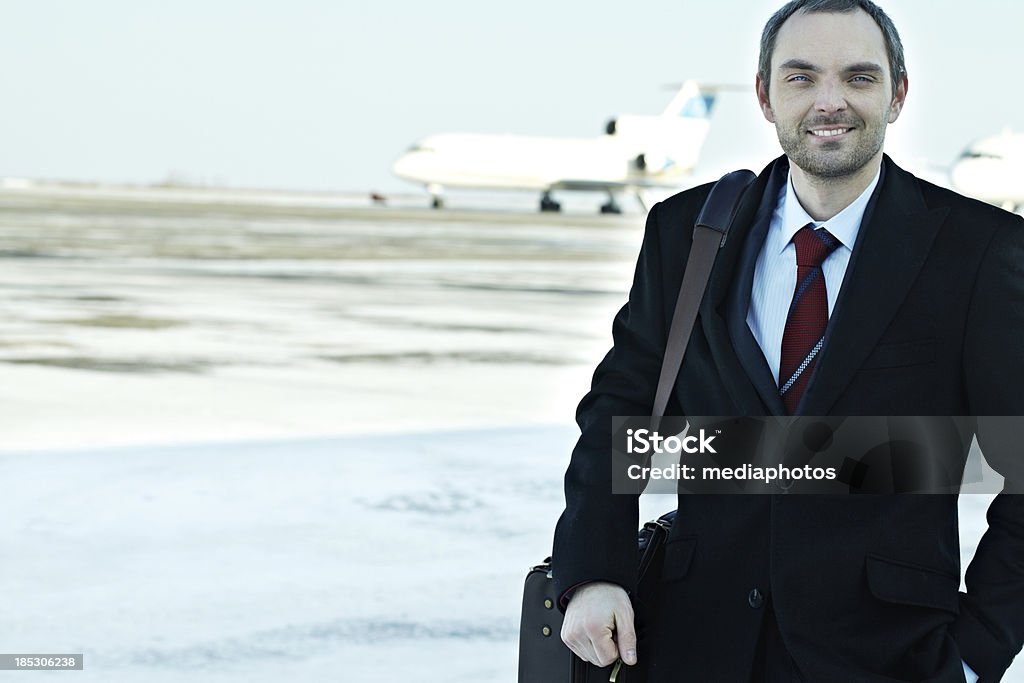 Business trip Portrait of a smiling businessman in the airfield 25-29 Years Stock Photo
