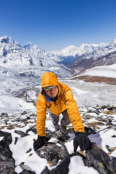 istock Nepali sherpa climbing in Himalayas 185306376