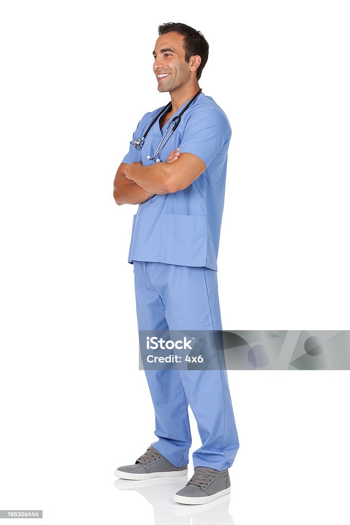 Feliz masculino médico em pé com os braços cruzados - Royalty-free Doutor Foto de stock