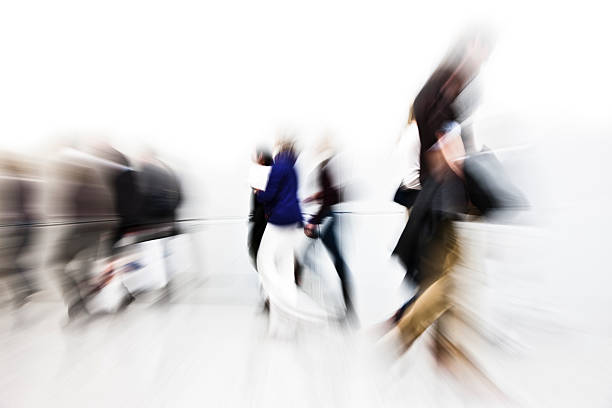 istock Abstract View of People Walking in Opposite Directions 185306937