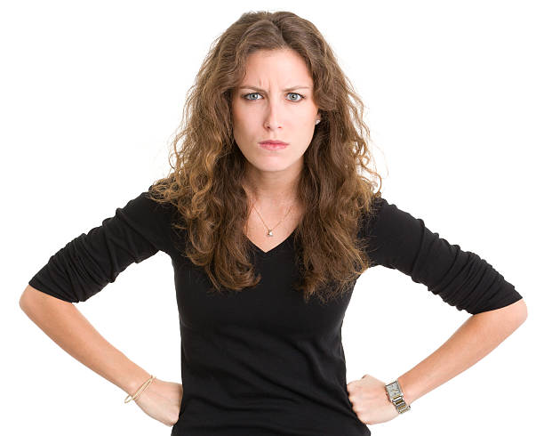 Angry Young Woman Frowning stock photo
