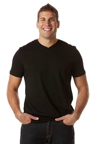 istock Happy man standing with his hands in pockets 185307672