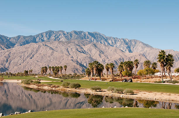 Lush green golf course in the Palm Springs desert stock photo