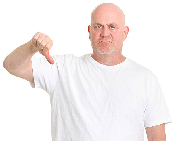 istock Disappointed Man Gives Thumbs Down 185308129