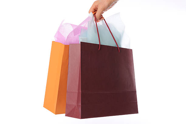 絶縁ショットのハンド用ショッピングバッグ、白背景に - shopping bag orange bag handle ストックフォトと画像