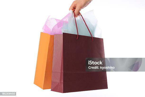 絶縁ショットのハンド用ショッピングバッグ白背景に - オレンジ色のストックフォトや画像を多数ご用意 - オレンジ色, 人間の手, 買い物袋