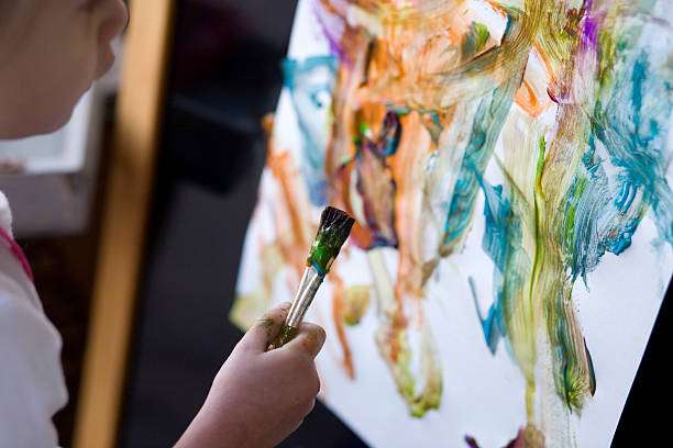 istock Little Girl Painting a Picture, Macro Image 185308564