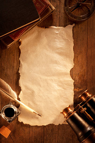 istock Antique Paper on a Wooden Desk 185308862