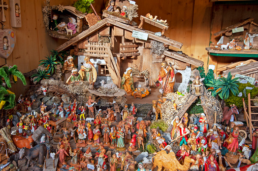 Christmas Nativity Scene Of Three Wise Men Magi Going To Meet Baby Jesus in the Manger with the City of Bethlehem in the distance 3D Illustration