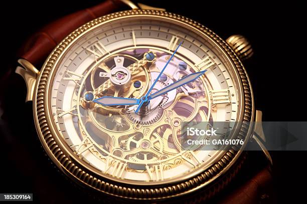 Golden Wristwatch On Black Stock Photo - Download Image Now - Watch -  Timepiece, Luxury Watch, Clock - iStock
