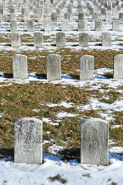 istock Cemetery Graves and Headstones in Rows, Copy Space 185309294