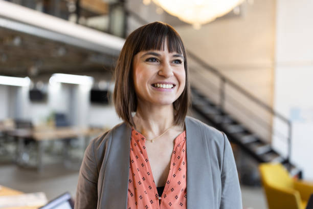 istock Successful woman entrepreneur smiling at startup office 1853092958