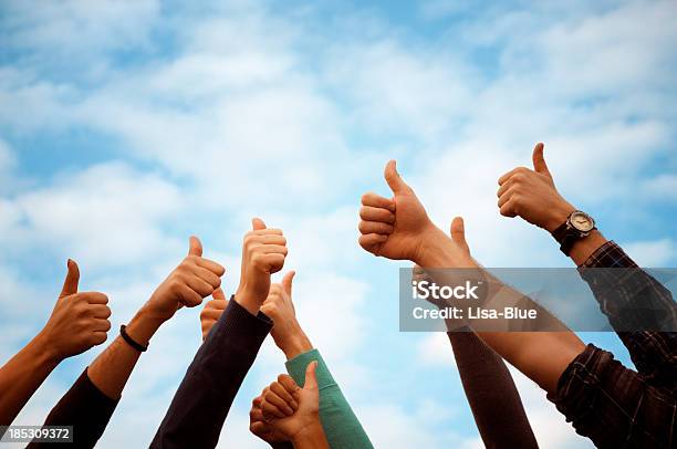 Group Of People Thumbs Up Blue Skycopy Space Stock Photo - Download Image Now - OK Sign, Thumbs Up, Endorsing