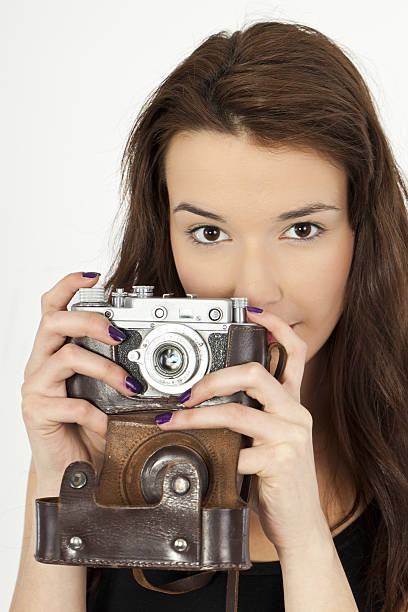 istock Beautiful Womanl with Old Photo Camera 185309548