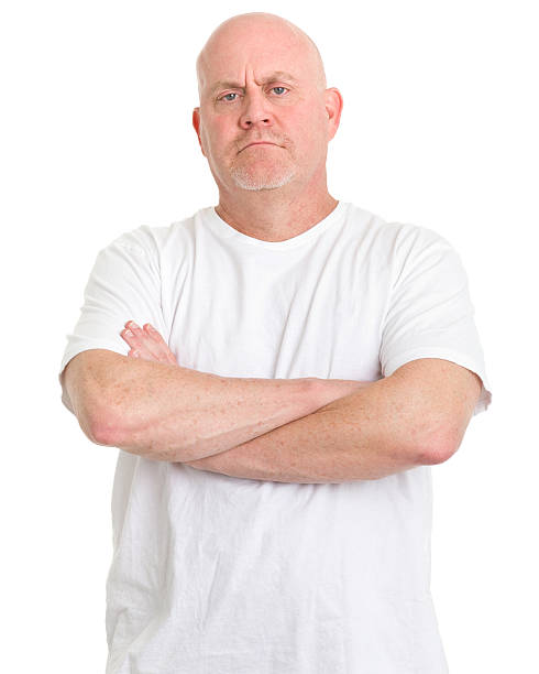 Tough Mature Man Crosses Arms