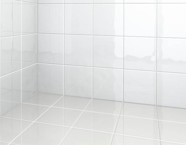 White Tiles in bathroom Bathroom walls with clean white ceramic tiles. tiled floor stock pictures, royalty-free photos & images