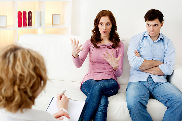 istock Marriage Therapy. Couple Talking to Counselor 185310055