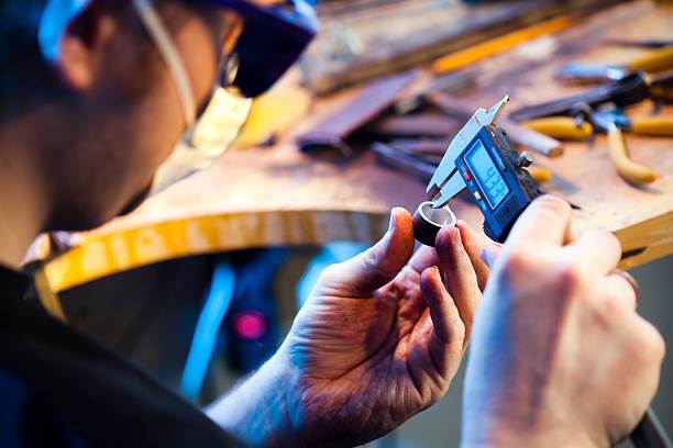 Jeweller measuring a ring