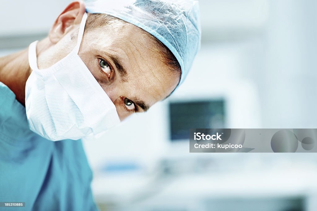 Saving lives is my passion Portrait of a male surgeon in operating room scrubs Adult Stock Photo