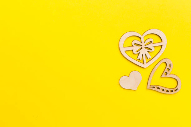 istock Wooden hearts on color background, top view 1853111642
