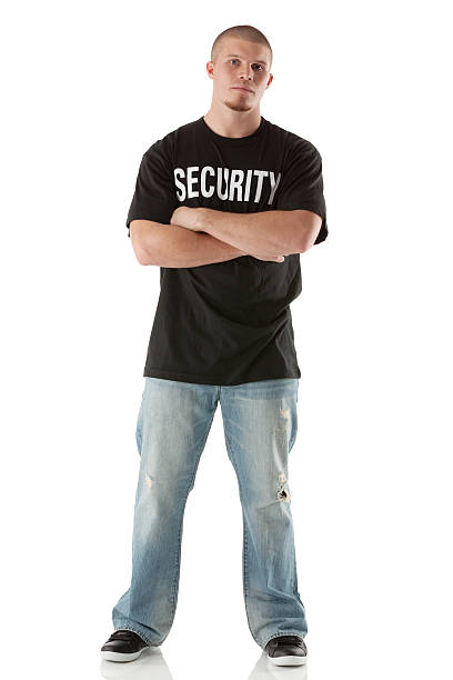 Bouncer standing with arms crossed