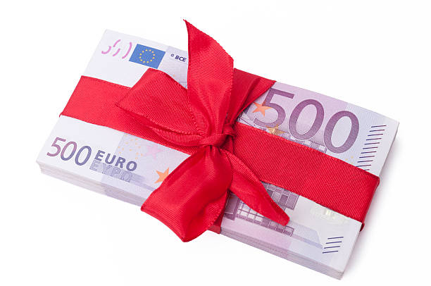 istock stack of 500 euro banknotes with red ribbon 185311861