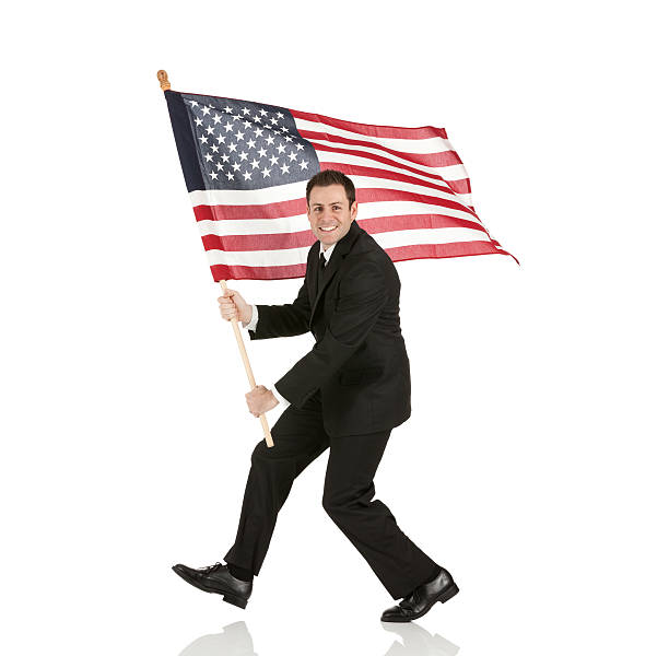 Businessman holding an American flag