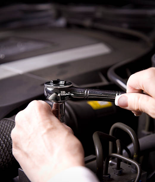 istock Woman Repairing Engine 185312573