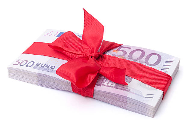 istock stack of 500 euro banknotes with red ribbon 185312832