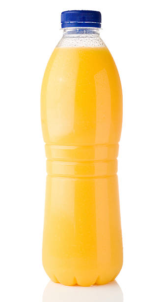istock Bottle of cold orange juice drink on a white background 185312903