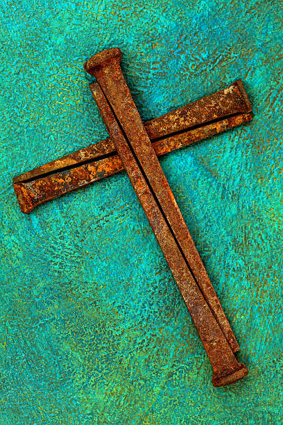 istock Religious: Cross of old Rusty square Nails 185313046