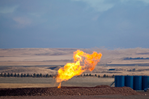 Natural gas burn-off flame on the Brakken oil fields of North Dakota.