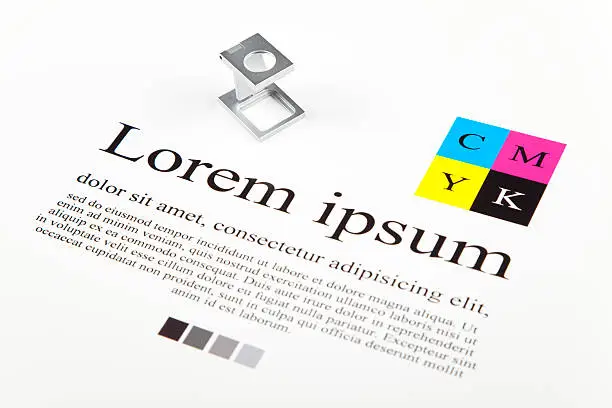 Photo of CMYK color guide and lorem ipsum text